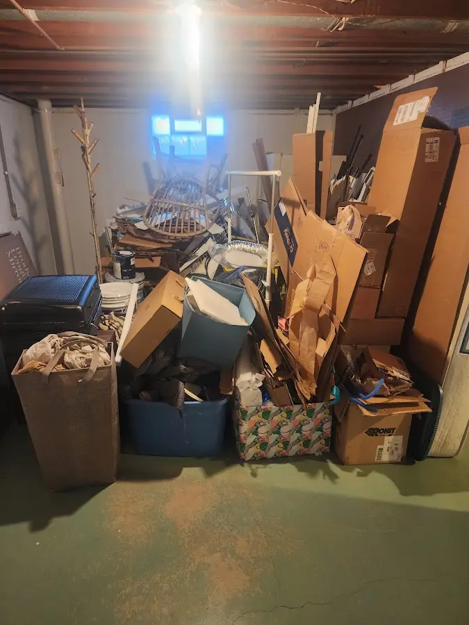 Roll-off dumpster container at job site for 15 Yard Dumpster Rental in Bismarck